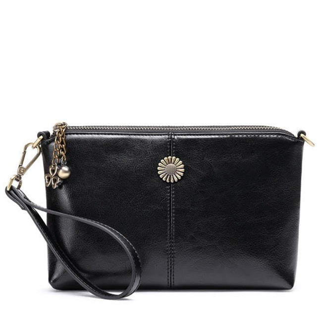 Genuine Cow Hide Clutch Purse with Leather tassel - Black good